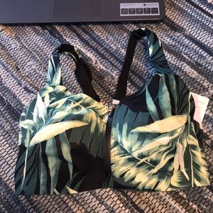 Victoria’s Secret black bra and leave cover